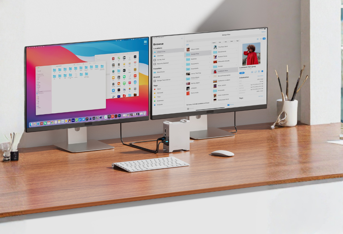 MiliForge Mac Mini docking station setup optimized for mobile view, showing the aluminum hub on a wooden desk.